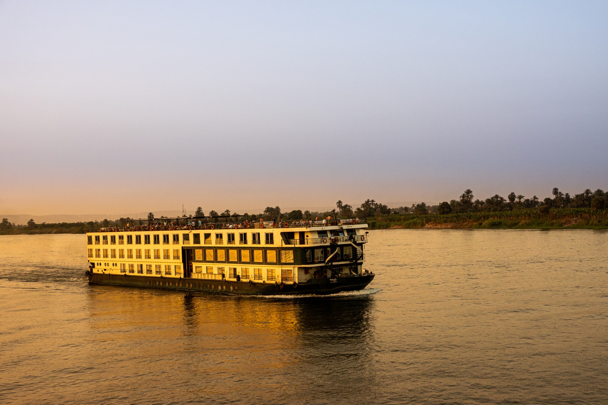 Tourist cruise sailing on the Nile River.